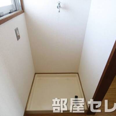 洗濯機置き場はこちらへ。