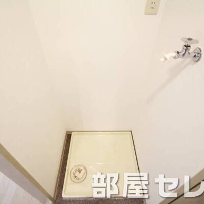 洗濯機置き場はこちらへ。